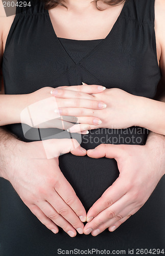 Image of Shape of heart on pregnant tummy