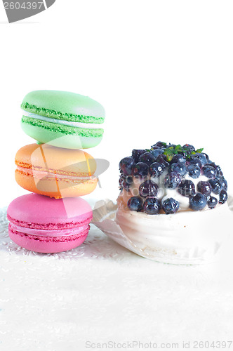 Image of Macarons and blueberry cake