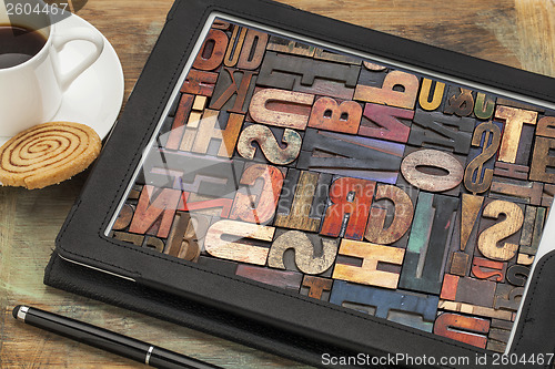 Image of typography concept on digital tablet