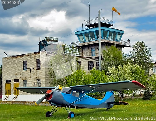 Image of Small airplane in little airport