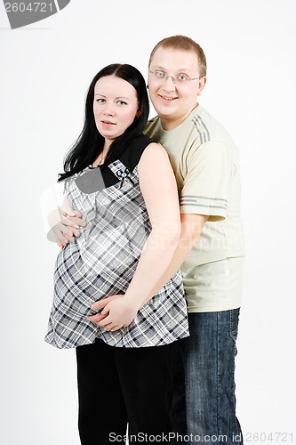 Image of happy parents. Husband and pregnant wife