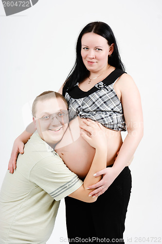 Image of happy parents. Husband and pregnant wife