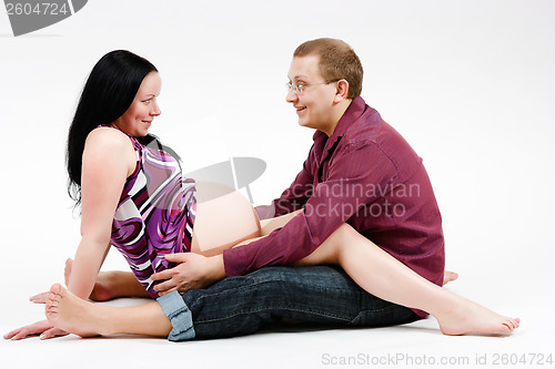 Image of happy parents. Husband and pregnant wife