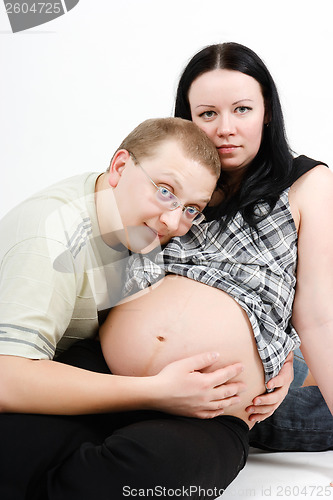 Image of happy parents. Husband and pregnant wife