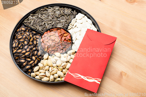 Image of Assorted Snack box and red pocket for Lunar new year