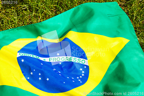 Image of Brazil flag on green glass