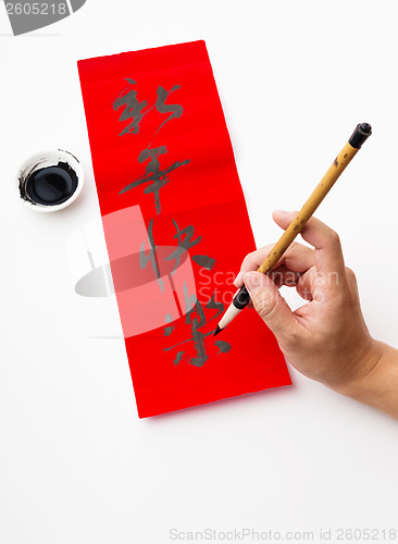 Image of Writing of the chinese new year calligraphy, phrase meaning is b