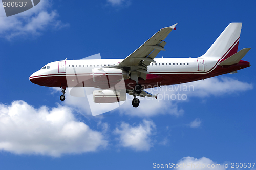 Image of Plane on blue and cloudy sky