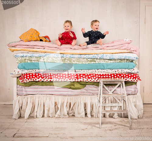 Image of Children on the bed - Princess and the Pea.