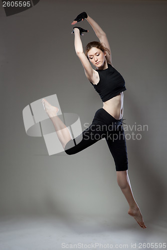 Image of attractive jumping woman 