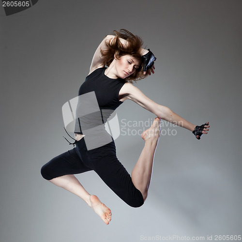 Image of attractive jumping woman