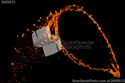 Image of orange water splash isolated on black