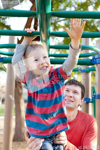 Image of family at the playground