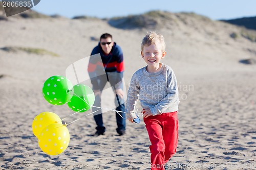 Image of family at the beach