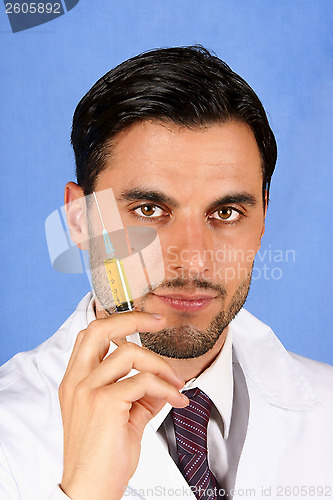 Image of Doctor holding syringe