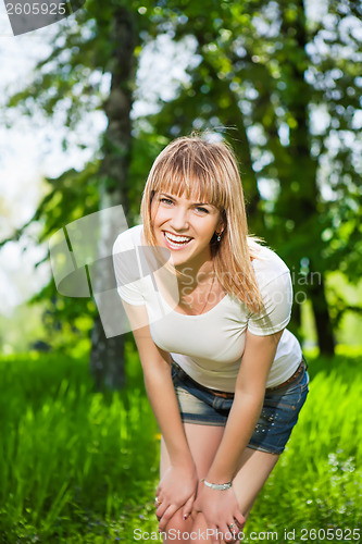 Image of Young joyful woman