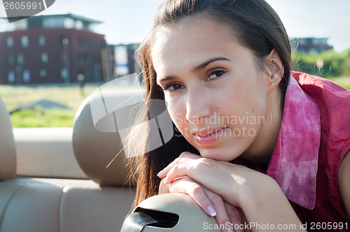 Image of Beautiful brunette woman, outdoor shooting