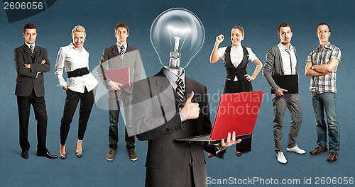 Image of Business Team With Lamp Head