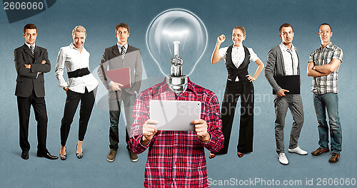 Image of Business Team With Lamp Head