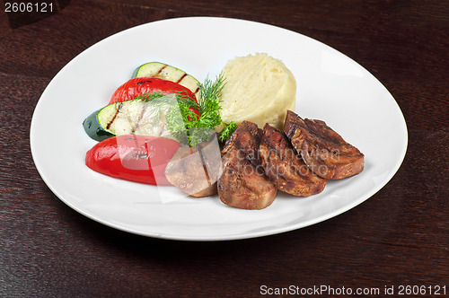 Image of tongue with grilled vegetable