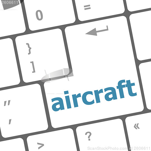 Image of aircraft on computer keyboard key enter button