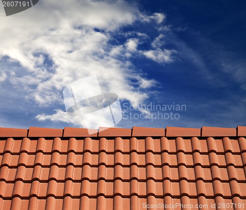 Image of Roof tiles and sky with clouds
