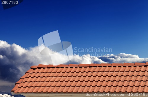 Image of Roof tiles and blue sky in nice sunny day