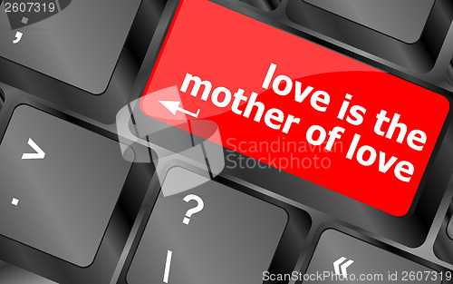 Image of computer keyboard with words love is the mother of love