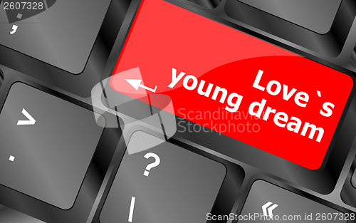 Image of love s young dream on key or keyboard showing internet dating concept