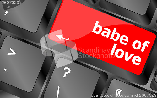 Image of babe of love on key or keyboard showing internet dating concept