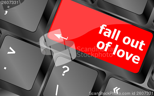 Image of Modern keyboard key with words fall out in love