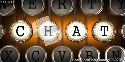 Image of Chat on Old Typewriter's Keys.