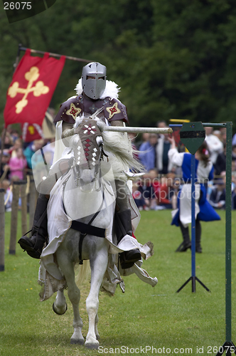 Image of Knights jousting warwick castle England uk
