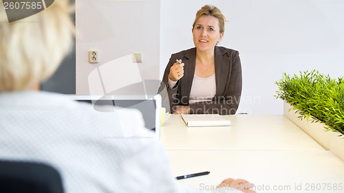 Image of Chatting coworkers