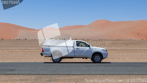 Image of Car on a empty in the Namib desert