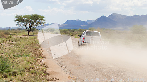 Image of Car driving a gravel road in Namibia