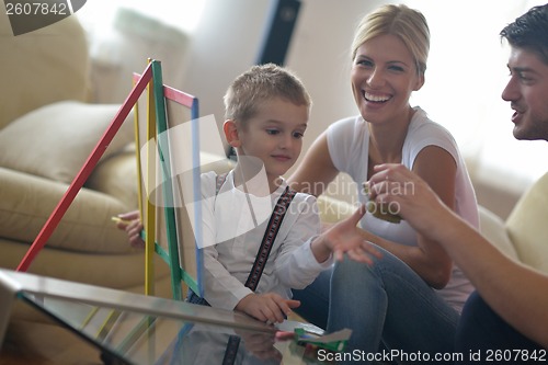 Image of family drawing on school board at home