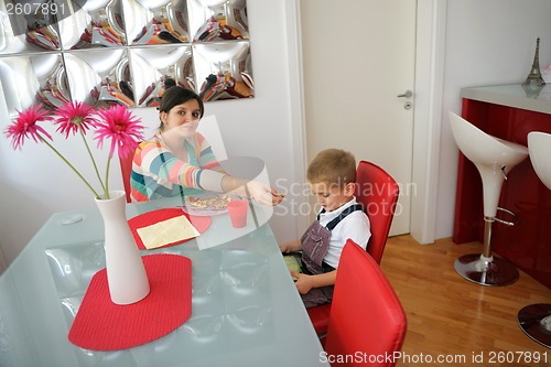 Image of family eating pizza