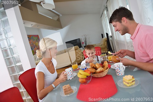 Image of family have healthy breakfast at home