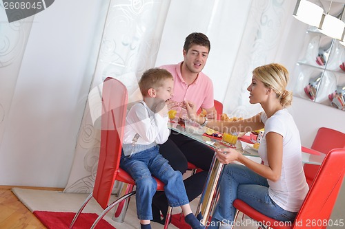 Image of family have healthy breakfast at home