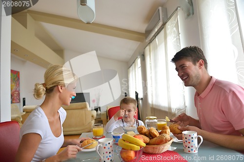 Image of family have healthy breakfast at home