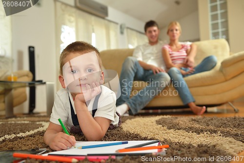 Image of family drawing on school board at home