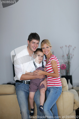 Image of family at home using tablet computer