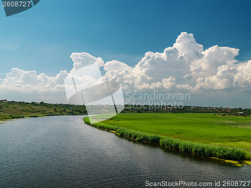 Image of white clouds over river