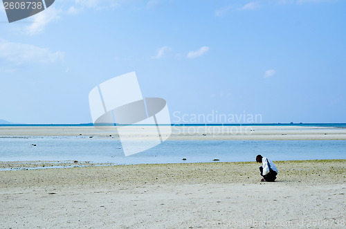 Image of Searching at beach