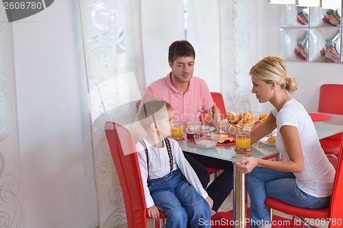 Image of family have healthy breakfast at home