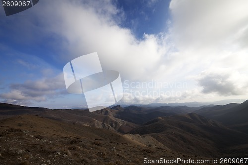Image of Mountains and blue sky with clouds