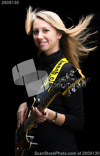Image of Woman with guitar