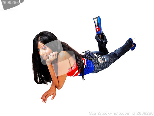 Image of Girl lying on floor.