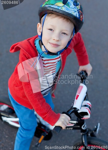 Image of kid riding bike